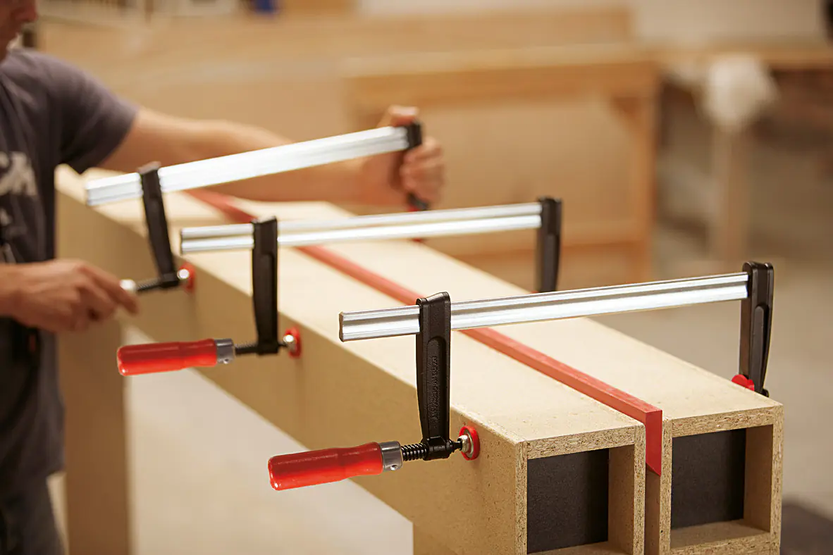 Bessey Tempergusszwinge 2-Komponentengriff mit Schutzkappen